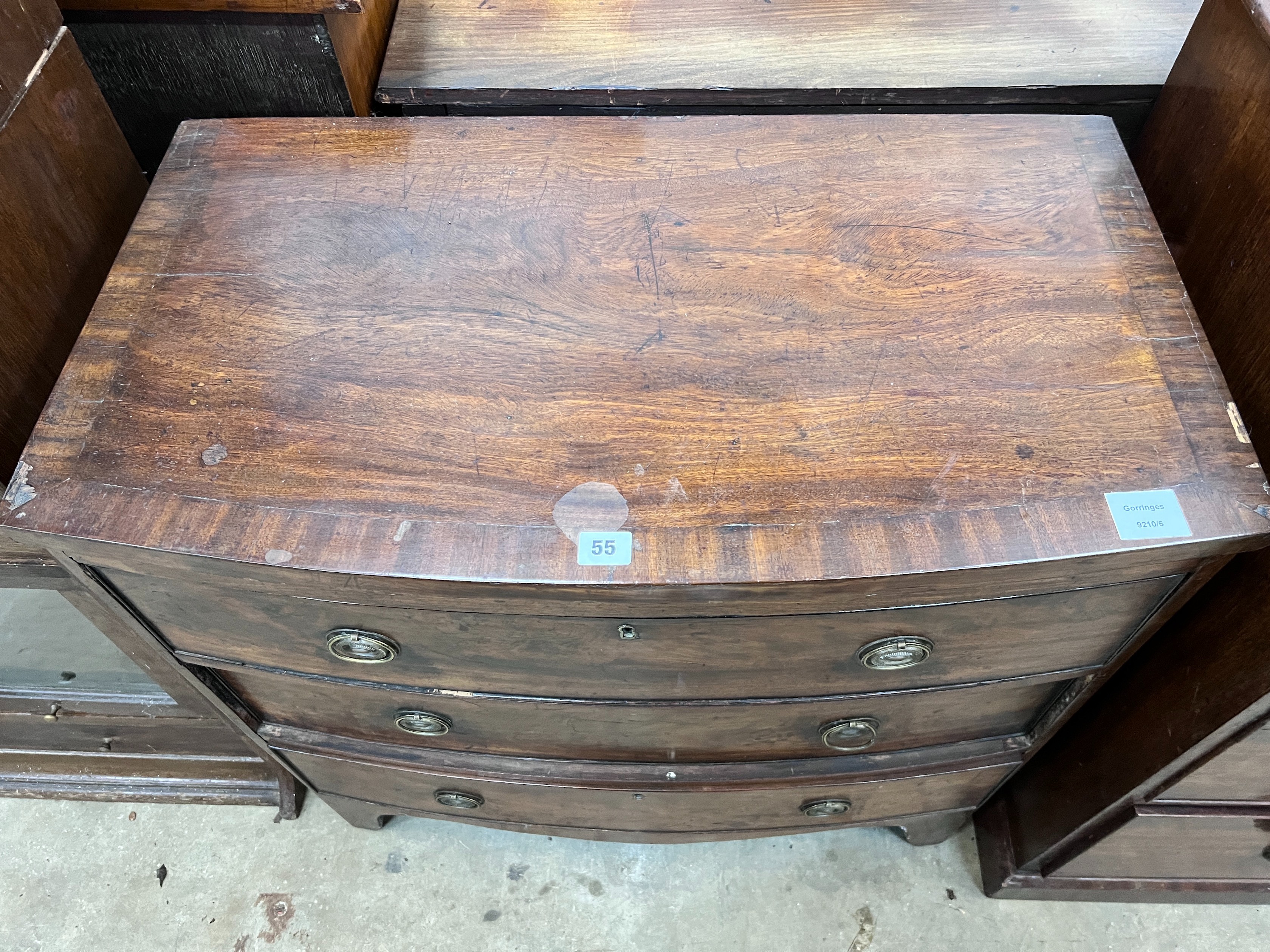 A small Regency banded mahogany three drawer bowfront chest, width 77cm, depth 43cm, height 77cm *Please note the sale commences at 9am.
